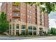 Elegant brick building with large windows, offering stunning city views and modern architecture at 326 Roswell Se St # 706, Marietta, GA 30060