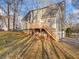 Exterior with a new deck addition, perfect for outdoor entertaining at 9061 Greenwood Way, Canton, GA 30115