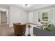 Contemporary living room with modern lighting, fresh paint, wood flooring, and stylish decor at 2115 Randolph Nw Cir, Kennesaw, GA 30144