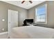 Bedroom with a window for natural light, a ceiling fan, and space for a desk setup at 516 Cunninghame Ct, Peachtree City, GA 30269