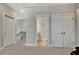 Bonus room with doors, closets, and access to an attic at 516 Cunninghame Ct, Peachtree City, GA 30269
