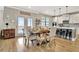 Dining room features a table set for a meal with a view into the kitchen at 516 Cunninghame Ct, Peachtree City, GA 30269