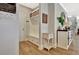 Inviting entryway featuring a built-in bench with storage and stylish decor accents at 516 Cunninghame Ct, Peachtree City, GA 30269