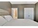 Bedroom features a calm atmosphere, a double closet, and an ensuite bathroom at 516 Cunninghame Ct, Peachtree City, GA 30269