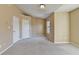 Spacious bedroom with neutral carpeting, paint and ample natural light at 1749 Coleville Oak Ln, Lawrenceville, GA 30046