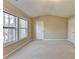 Bright bedroom featuring three windows offering lots of natural light at 1749 Coleville Oak Ln, Lawrenceville, GA 30046