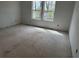 A bedroom with natural light and windows, perfect for relaxation at 2096 Boxwood Cir, Conyers, GA 30094