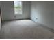 A simple bedroom design with a window, offering plenty of natural light at 2096 Boxwood Cir, Conyers, GA 30094