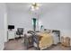 Comfortable bedroom with a desk, chair, and window, perfect for relaxation or study at 2250 Snug Ne Hbr, Marietta, GA 30066