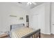 Comfortable bedroom with vaulted ceiling, a ceiling fan, a bright window and wood floors at 2250 Snug Ne Hbr, Marietta, GA 30066