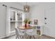 Bright dining area featuring a modern light fixture and dining set at 2250 Snug Ne Hbr, Marietta, GA 30066