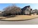 Street view of home with a well-manicured lawn and two car garage at 2250 Snug Ne Hbr, Marietta, GA 30066