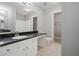 Bathroom features white vanity, granite countertop, and a large mirror at 2360 Johnson Rd, Atlanta, GA 30345