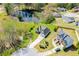 Aerial view of a lakeside home with an expansive backyard at 207 Meadow Lake Dr, Carrollton, GA 30116