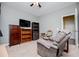 Bedroom offering a recliner, shelving, and seamless access to other areas of the home at 207 Meadow Lake Dr, Carrollton, GA 30116