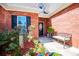 Charming front entryway with brick facade and bench seating at 207 Meadow Lake Dr, Carrollton, GA 30116