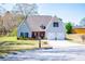Charming two-story home with a well-manicured lawn and attached two-car garage at 207 Meadow Lake Dr, Carrollton, GA 30116