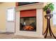 Contemporary fireplace with white mantle and brick-look accents at 207 Meadow Lake Dr, Carrollton, GA 30116
