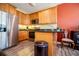 Well-equipped kitchen features stainless steel appliances and plentiful wood cabinetry with a breakfast area at 207 Meadow Lake Dr, Carrollton, GA 30116