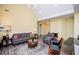 Bright and inviting living room with high ceilings, featuring comfortable seating and stylish decor at 207 Meadow Lake Dr, Carrollton, GA 30116