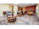 Spacious living area seamlessly blends living, dining, and kitchen spaces, ideal for modern living and entertaining at 207 Meadow Lake Dr, Carrollton, GA 30116