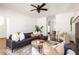 Open-concept living area with hardwood floors, modern furnishings, and a seamless flow to the dining space at 513 Boulevard Se, Atlanta, GA 30312