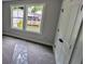 Bedroom features two windows and a closet at 1698 Cunningham Sw Rd, Marietta, GA 30008