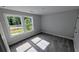 Bright bedroom with two windows that provide natural lighting at 1698 Cunningham Sw Rd, Marietta, GA 30008