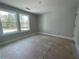 Bedroom with a window providing natural light, great for creating a cozy and inviting atmosphere at 1698 Cunningham Sw Rd, Marietta, GA 30008
