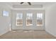 Bright bedroom features a trey ceiling and large windows at 2350 Edgar Park Pl # 98, Duluth, GA 30096