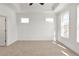 Neutral bedroom with plush carpeting, ceiling fan and natural light at 2350 Edgar Park Pl # 98, Duluth, GA 30096