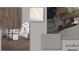 Flooring samples including hardwood, laundry tile, carpet, and concrete at 2350 Edgar Park Pl # 98, Duluth, GA 30096