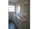 Bright bathroom with double vanity and new fixtures at 3531 Creighton Sw Rd, Atlanta, GA 30331
