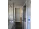 Updated bathroom with a granite vanity top, modern fixtures, and a sleek, stylish design at 3531 Creighton Sw Rd, Atlanta, GA 30331