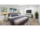 Staged bedroom with luxury vinyl plank flooring, decor, and natural light at 6446 E Windsor Ln, Norcross, GA 30093