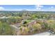 Scenic aerial view of the community with lush greenery and a mountain in the background at 1506 Knights Trl, Stone Mountain, GA 30083