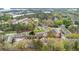 Community aerial view with mature trees, townhomes, and manicured landscaping at 1506 Knights Trl, Stone Mountain, GA 30083