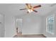 Neutral bedroom with wood floors, and a ceiling fan at 1506 Knights Trl, Stone Mountain, GA 30083