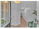 View of the entryway leading into the house with tiled flooring and natural light at 1506 Knights Trl, Stone Mountain, GA 30083