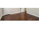 Bedroom with hardwood floors and a view of doorways leading to other rooms at 1563 Mayflower Sw Ave, Atlanta, GA 30311