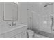 Bathroom featuring a glass shower, marble counter tops, and new fixtures at 2485 Brooks Rd, Dacula, GA 30019