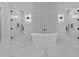 Elegant bathroom features a standalone tub between two glass-enclosed walk-in showers at 2485 Brooks Rd, Dacula, GA 30019