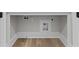 Laundry hookups are conveniently located in a bright space with wood flooring and modern connections at 2485 Brooks Rd, Dacula, GA 30019