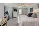 Bedroom features an exercise machine, dresser, plush carpet, and a comfortable bed at 304 Gilmer Ct, Canton, GA 30115