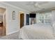 Serene bedroom with soft carpet, a large window, and access to a private bath, creating a relaxing retreat at 304 Gilmer Ct, Canton, GA 30115