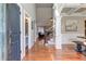 Spacious foyer with hardwood floors, an open staircase, and elegant architectural details at 304 Gilmer Ct, Canton, GA 30115