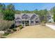 Beautiful two-story home with a well-manicured front yard, a classic design, and a welcoming entrance at 304 Gilmer Ct, Canton, GA 30115