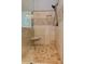 Detailed view of the walk-in shower featuring decorative tile and glass surround at 304 Gilmer Ct, Canton, GA 30115
