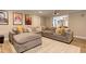 Cozy media room featuring a large sectional sofa, projector screen, and comfortable viewing experience at 304 Gilmer Ct, Canton, GA 30115