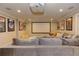 Home theater features comfy, oversized seating and a large projector screen for an immersive viewing experience at 304 Gilmer Ct, Canton, GA 30115